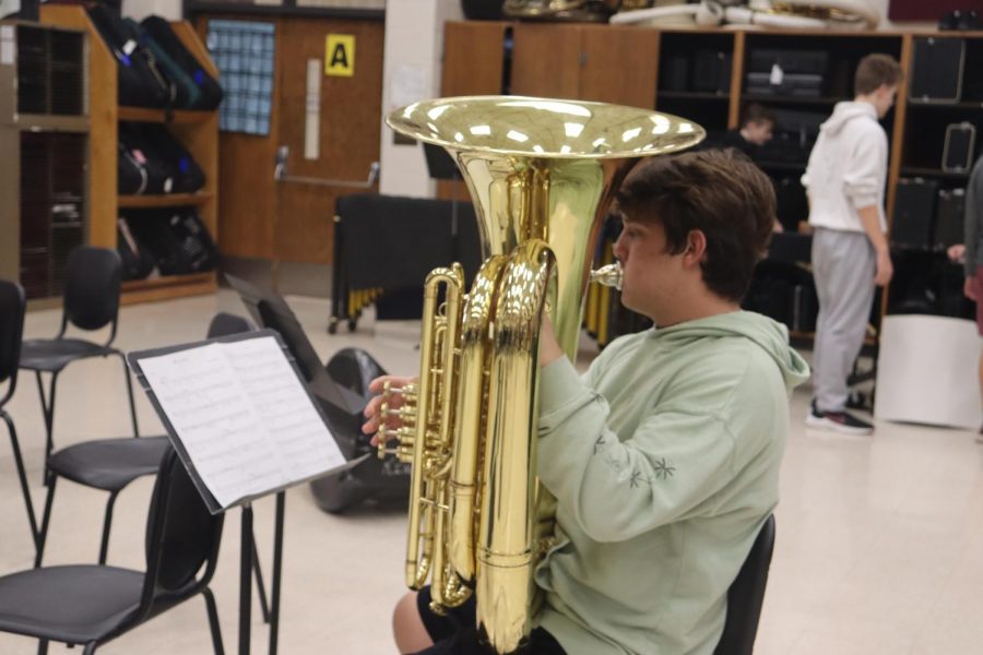 Sophomore Galahad Nichols plays his instrument during band