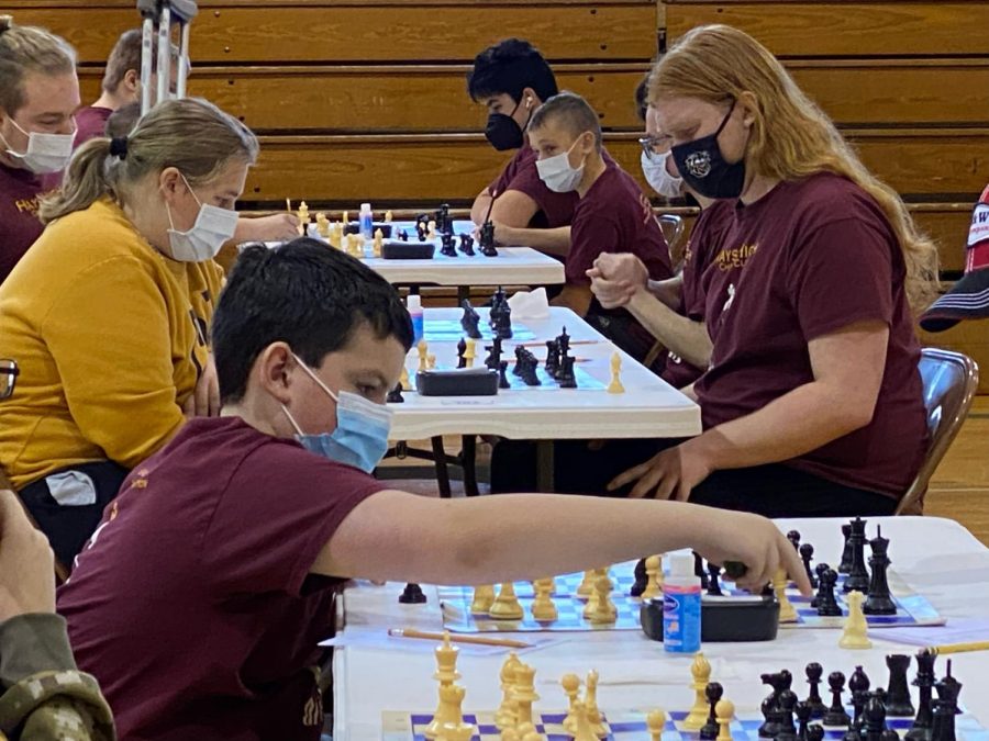 Hays High, Thomas More Prep-Marian, Salina Sacred Heart and Heritage Academy students compete in a tournament on Saturday, Feb. 8.