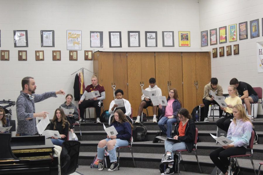 Chamber singers rehearse for their winter concert that was held December 16, 2021.