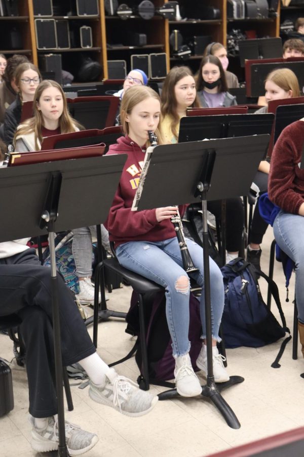 Band students practice upcoming music in the band room.