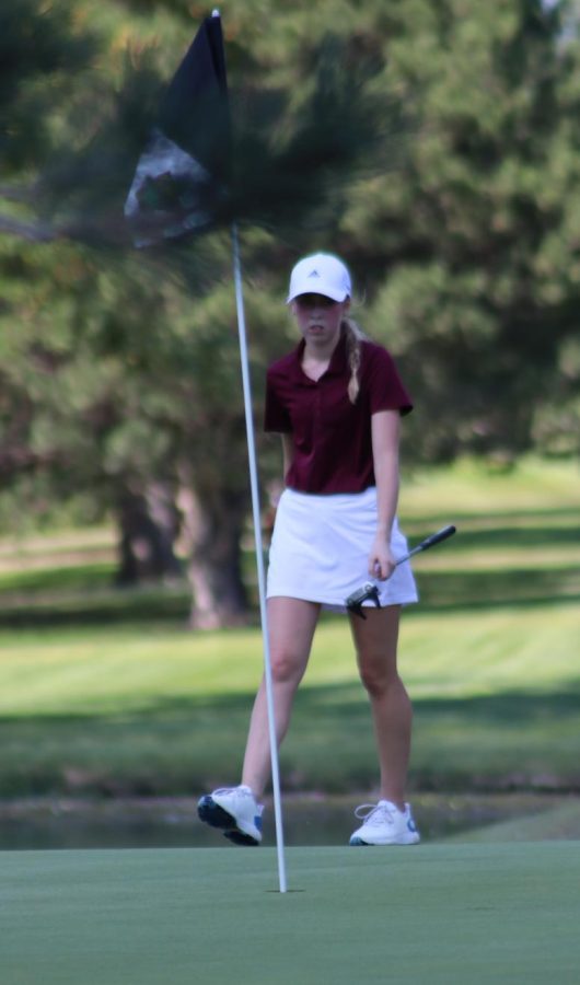 Senior Katie Dinkel playing at Smoky Hill Country Club during the beginning of season, she later went on to win WAC-Player of the year.