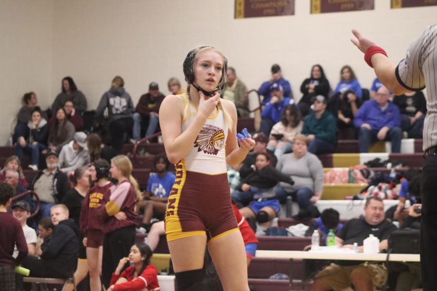 Freshman, Jaylee Summers finishes her match on Jan. 14 at Hays High
