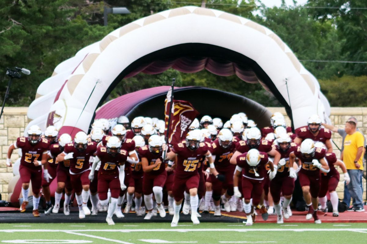 On Sept. 20, the Indian football team, led by senior Wyatt Kirkpatrick, storms Lewis Field before the game against Manhattan. The Hays Indians lost to the Manhattan Indians, 34-30. "Wyatt said this," Kirkpatrick said.