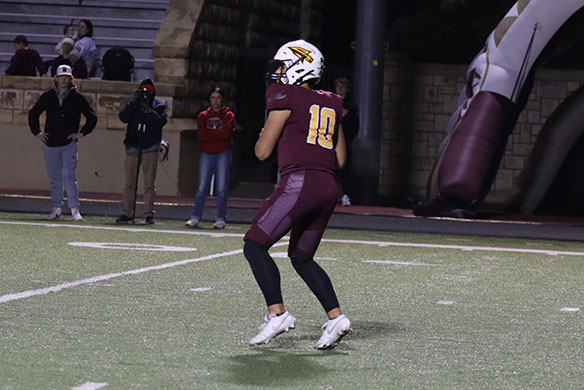 Carter Graham drops back on a pass play against Liberal on October 25.