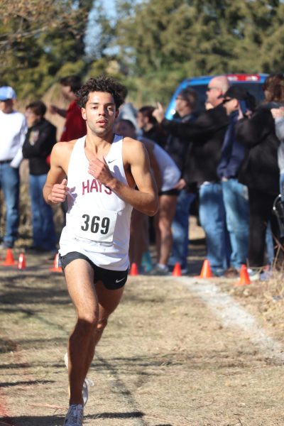 Senior Taevian Maupin runs the final straight at Great Bend on Oct. 26 to earn a chance to compete at state.