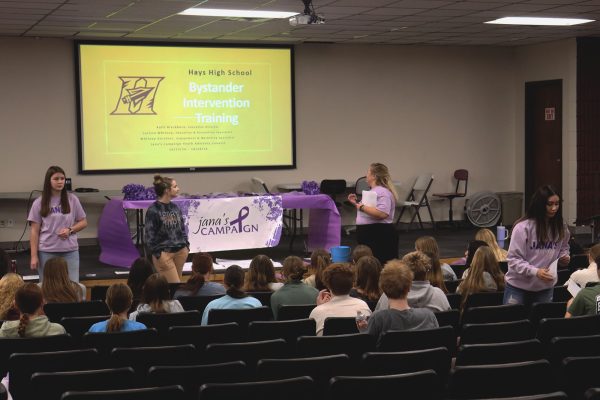 Junior Johanna Jones, junior Lindsey Hernandez, and sophomore Peyton Mackey help with bystander training 