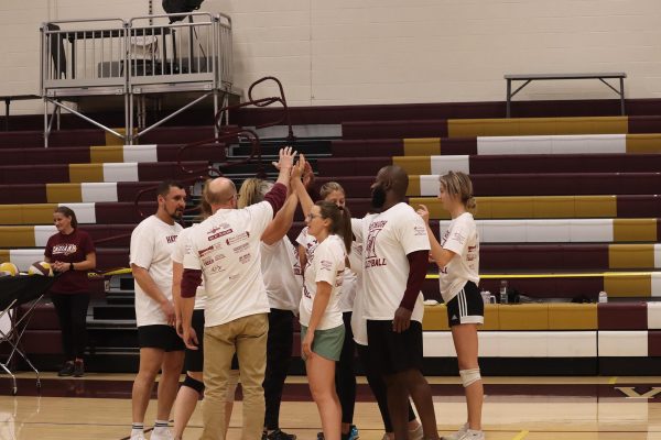 The Hays High staff volleyball team breaks down their team conversation. 