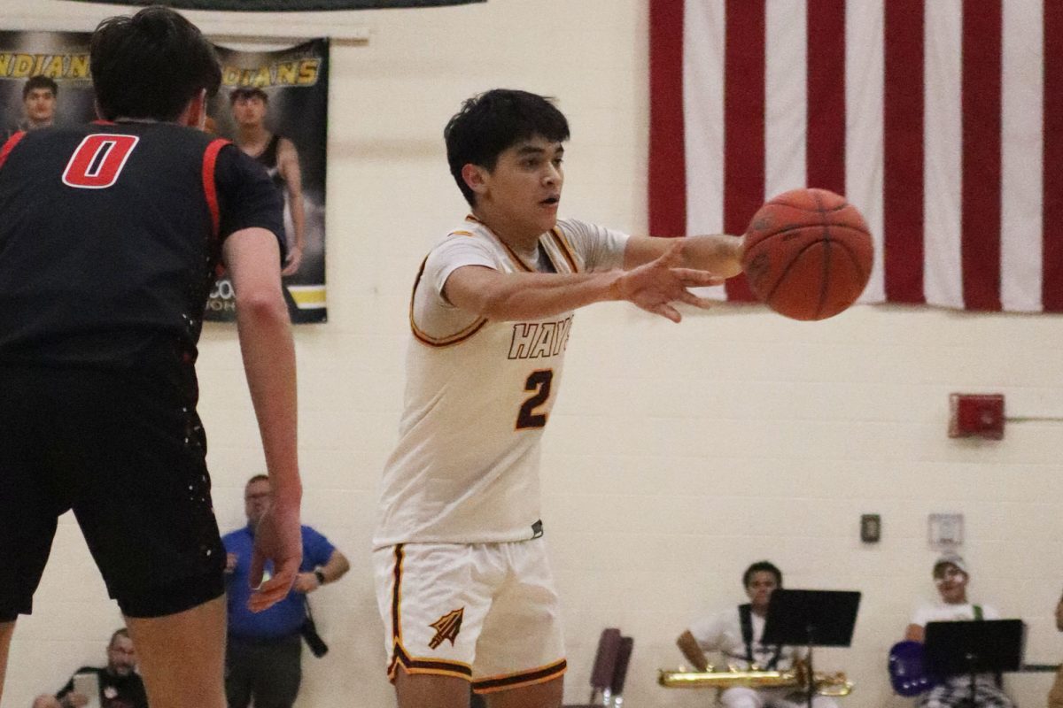 Johnny Cano makes a pass in Hays High's game against Great Bend.