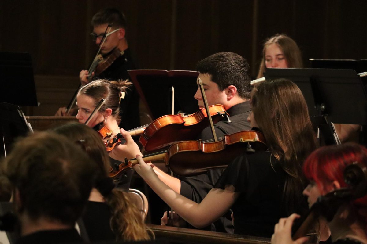 Junior Canon Weber plays viola during Dvorak's Eighth Symphony on May 10.